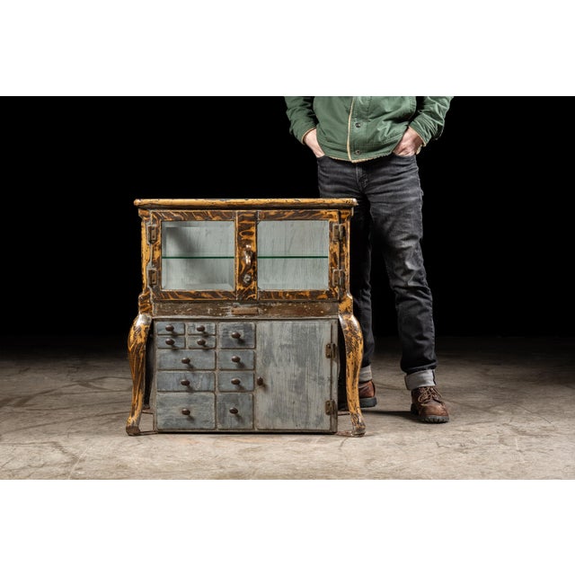 c. 1900s; Clark and Roberts Co. - Indianapolis, IN Antique steel medical cabinet with glass walls. This unique piece was...