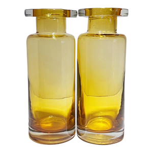 Pair of "The Alchemist" Jars in Amber