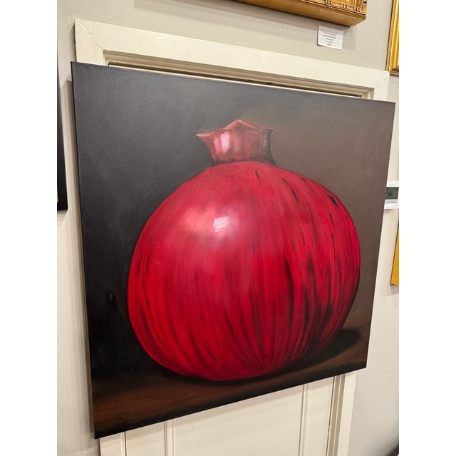 This is a contemporary oil on canvas painting, done by the Boston artist, John Young. It depicts a large pomegranate. It...