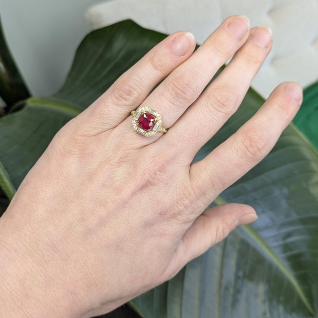 Striking 2.2ct Madagascar ruby ring accented with natural diamonds, glowing with rich red brilliance. Set in solid 14k...