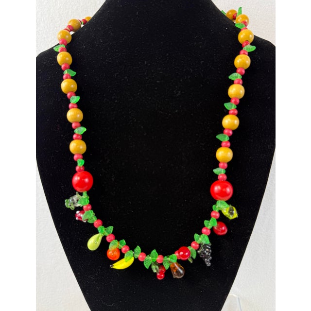 Murano glass tutti fruitti necklace with hand blown seamless glass fruit charms. Hook clasp. 1940s-1950s. Measures a long...