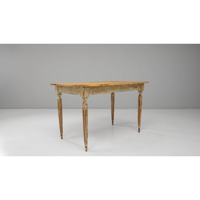 This 20th Century French Gustavian wood patinated side table embodies the graceful simplicity of the Gustavian style,...