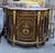 Introduce timeless grandeur into your home with this magnificent French Louis XVI display commode cabinet, masterfully...