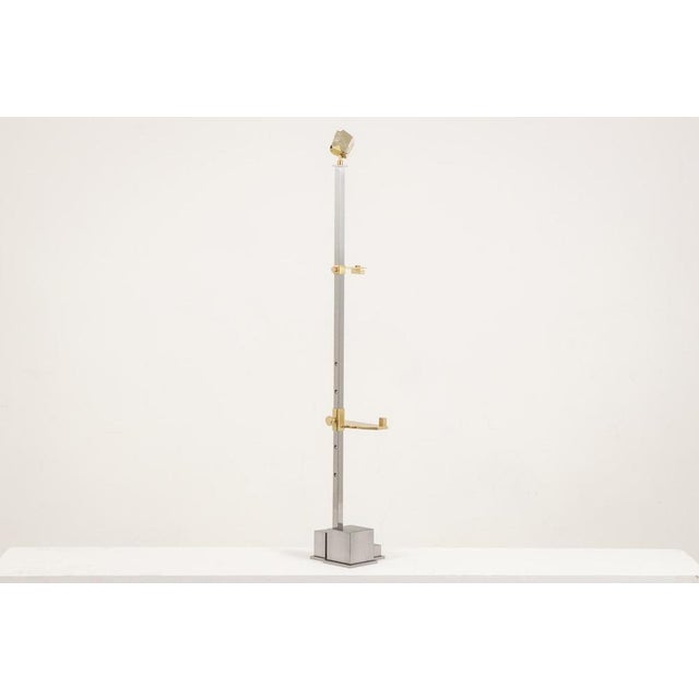 A metal easel with bronze accents and a top section finished in pyrite. Contemporary French artist’s work. Decorative...