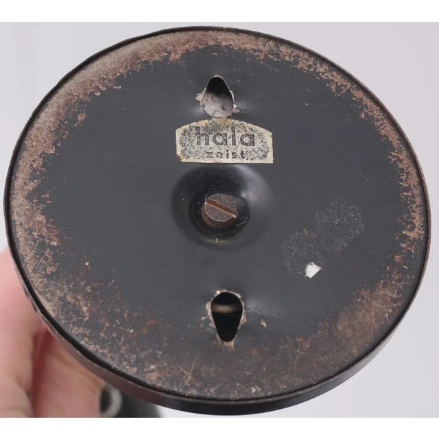 Lovely sweet little desk lamp by Hala Zeist. Black color. Switch on the base. 1950s good working condition. This piece has...