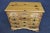 Chippendale style block front chest , made of knotty pine , 4 drawers , carved shell design on top drawer , ogee bracket feet