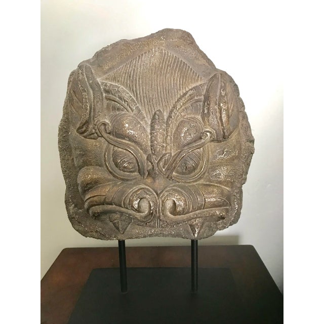 Fun faux wood spirit mask on a black wooden base - a great way to add some Asian design touch to your decor Excellent...