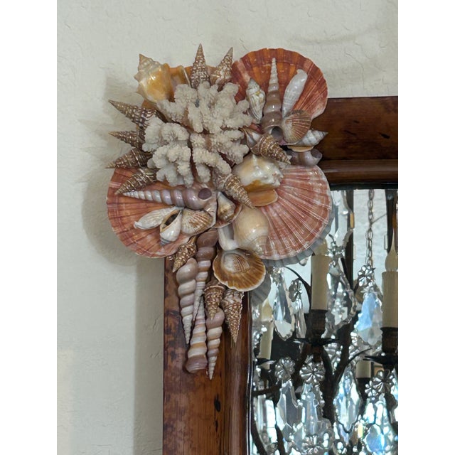 Stand out Boho chic vintage British colonial style wall mirror, crafted in burnt bamboo with exotic seashells added later.