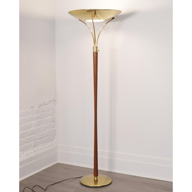 Torchiere floor lamp attributed to Gerald Thurston for Lightolier, manufactured in the USA during the 1960s. Featuring a...