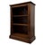 A beautifully proportioned 20th-century oak open bookcase by Ercol, combining understated British design, practical open...