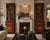 A superb and highly decorative pair of antique Regency mahogany inlaid bookcases of exceptional quality and elegant...