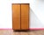 A stunning armoire made by British furniture maker Beautility, this Mid Century Modern Vintage Teak Gentlemens Armoire...