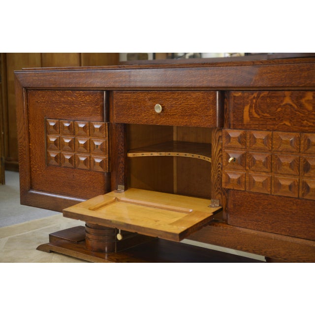 Brutalist Buffet attributed to Charles Dudouyt, 1940s, in Very Good conditions. Designed 1920 to 1949 This piece is...