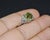 Gorgeous estate solid 900 platinum 3.74CTS diamond and peridot ring. This ring features a magnificent round brilliant-cut...