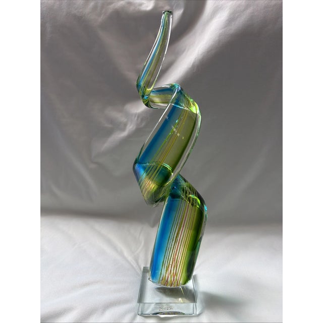 Spectacular vintage Mid-Century Modern hand-blown art glass vase featuring a striking blue and green spiral ribbon swirl...