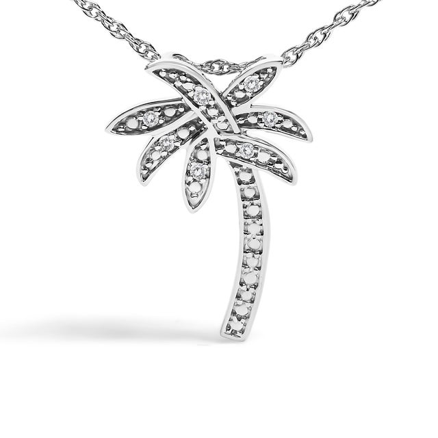 Immerse yourself in the elegance of nature with this exquisite .925 sterling silver pendant necklace, fashioned into a...