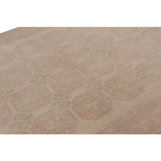 This 7x10 vintage rug is believed to be a rare mid-century Ersari rug, hand-knotted in wool and originating in Turkey...