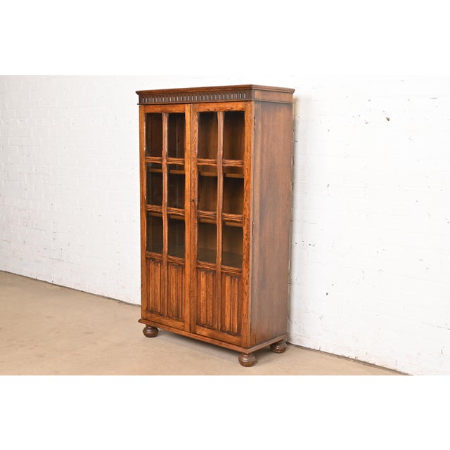 English Antique English Tudor Carved Oak Glass Front Bookcase Cabinet, Circa 1920s For Sale - Image 3 of 12