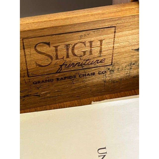 This oak desk is from Charles R. Sligh Jr.'s famous "Cross Country" line, which was introduced in 1950. This specific...