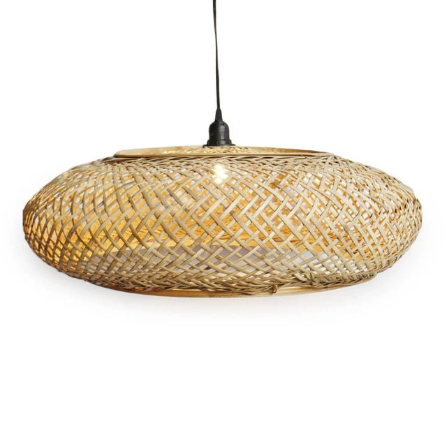 Hand woven rattan round beret pendant lantern. Beautiful hand crafted design and detail with open bottom. Each may vary in...