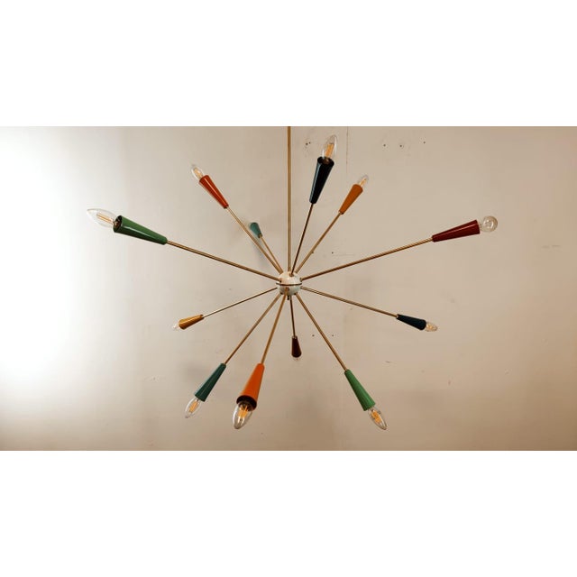 Sputnik 12-Light Hanging Lamp from Stilnovo, in Very Good conditions. Designed 1960 to 1969 This piece is attributed to...