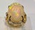 2010s 10 Carat Oval Shape Ethiopian Opal Cocktail Ring 14 Karat Yellow Gold For Sale - Image 5 of 18