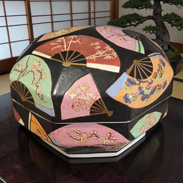 This vintage Japanese Meiji Imary large 13.5'' x 10'' octagonal covered box is a stunning piece of porcelain craftsmanship...