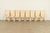 A sleek and stylish set of eight Italian Modern or Postmodern high back dining chairs In the manner of Mario Bellini for...