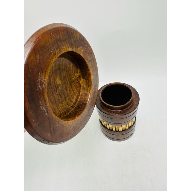 Unique vintage decorative box featuring a rich, dark-stained wooden body accented with natural porcupine quills. The...