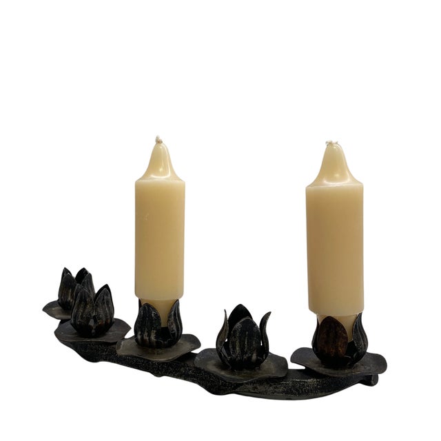 A striking example of mid-century Brutalist design, this sculptural candle holder transforms blooming lotus flowers into a...