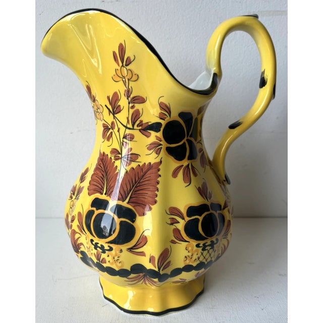 This strikingly dramatic hand-painted Italian faience pitcher was made by Este Ceramiche, the company that Tiffany sells...