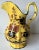 This strikingly dramatic hand-painted Italian faience pitcher was made by Este Ceramiche, the company that Tiffany sells...