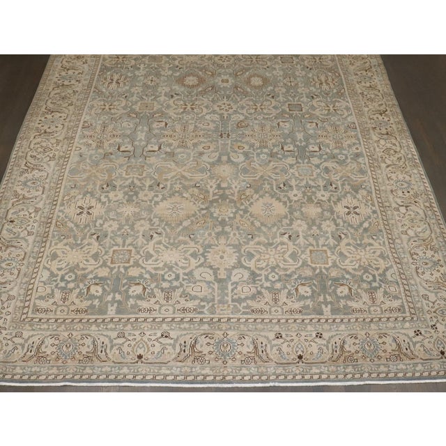 An early 20th century malayer carpet in neutral sea foam colors