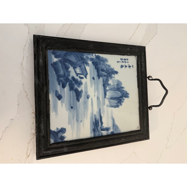 A striking pair of antique Chinese blue and white rectangular porcelain panels, beautifully framed and ready to hang....