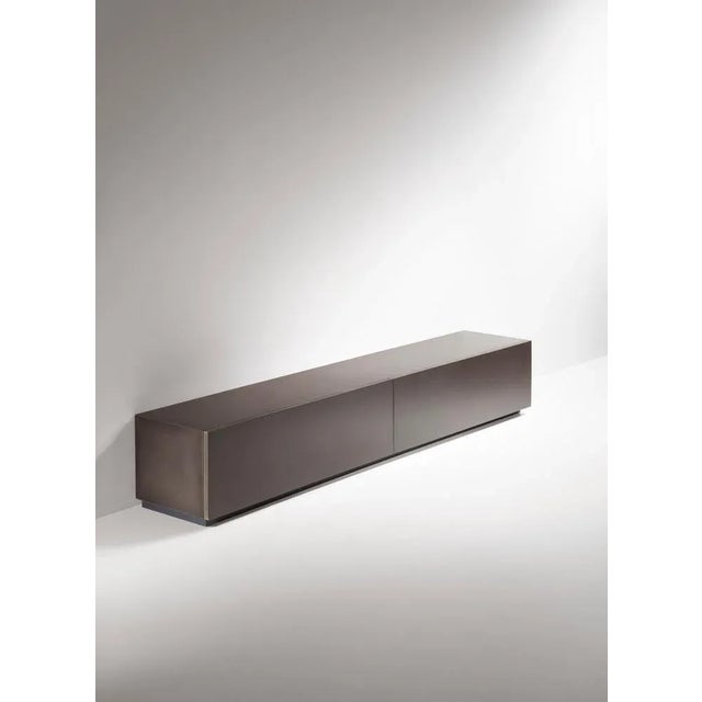 Tako floor console by de castelli dimensions: w 220 x d 41 x h 40 cm materials: delabré b stainless steel, natural oak wood