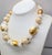 Modern Vintage 1980s Signed Givenchy White & Gold Ying Yang Beaded Necklace For Sale - Image 3 of 9