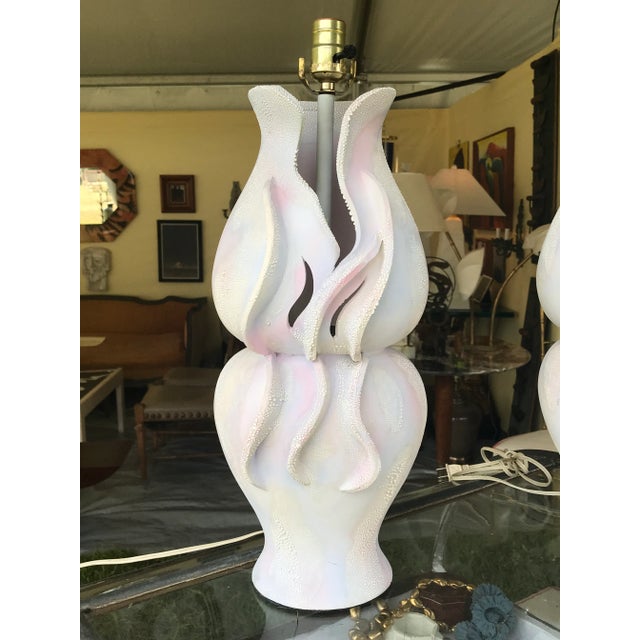 Pair of whimsical ceramic table lamps circadian 1980’s. Have some light pastel tones on white surface. Very little wear.