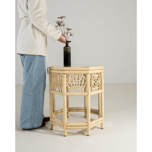 Carved fretwork side table in Warm Ivory. The warm ivory surface highlights pierced geometric apron, hexagonal top,...