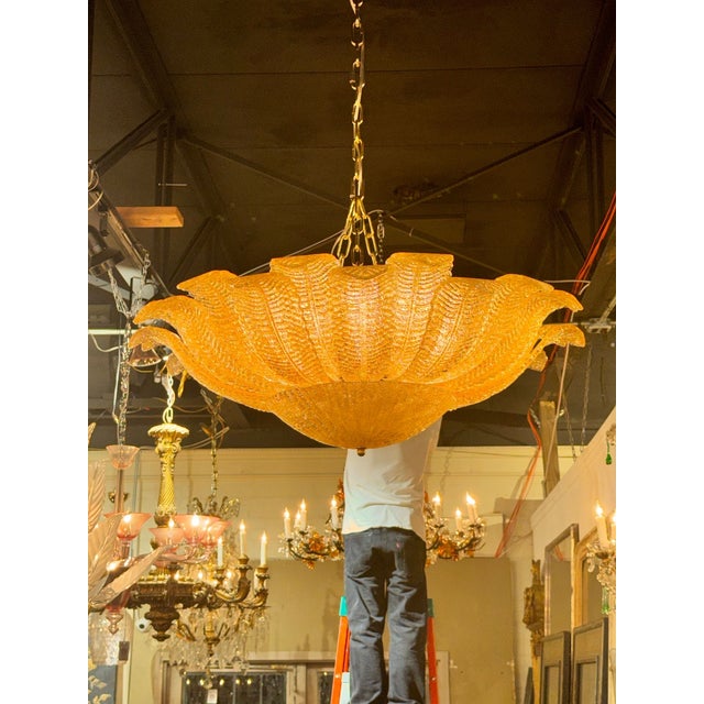 The Large Murano Granola Gold Flush Mount Chandelier is a stylish and elegant lighting fixture. Featuring gorgeous...