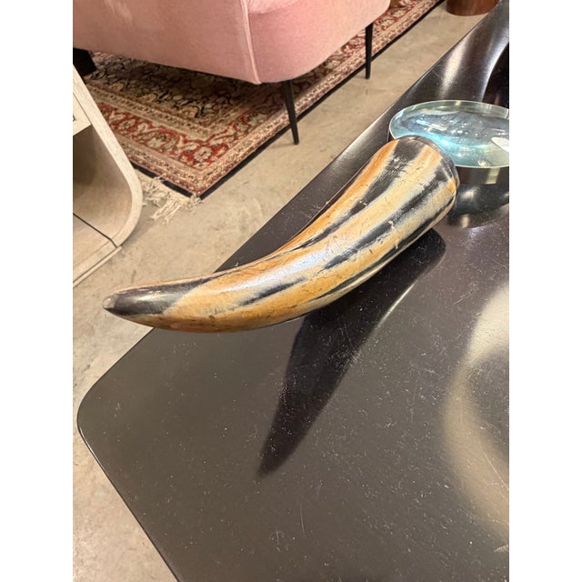 Gorgeous magnifying glass featuring a bone-horn handle in stripes of brown and tan. Feels wonderful in hand. Magnifying...