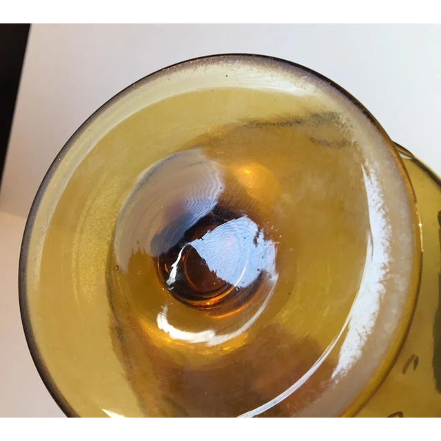 This large goblet or 'Cognac glass'-shaped vase with cut-out dots was manufactured in Denmark during the 1920s or 1930s by...