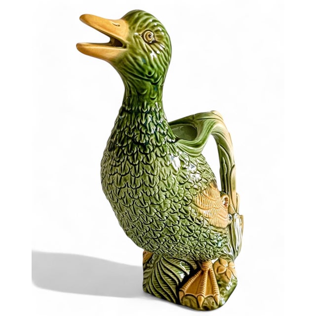 The most beautiful pitcher I have ever seen. You just want to kiss it and hug it. So charming!!! In pristine condition....