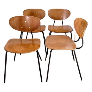 Mud Century Kurt Nordstrom for Knoll Plywood Stacking Dining Chairs With Triple Brass Circles on Back Splat For Sale