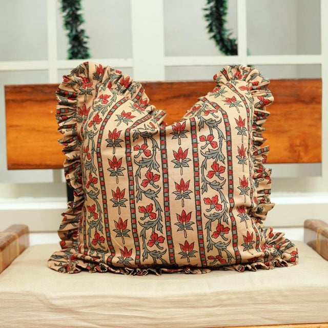 Elevate your home décor with this Floral Block Print Frill Cushion Cover, beautifully handmade by skilled artisans in a...