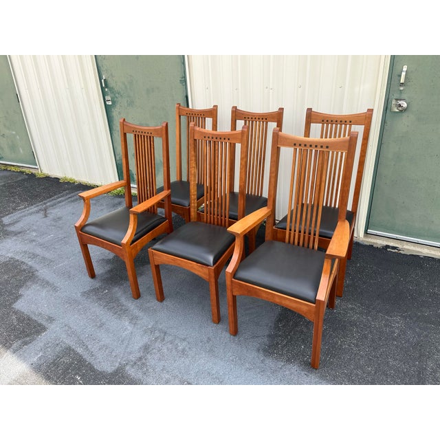 Made by American furniture maker Stickley at the tour of the century, this set of six Cherry mission style chairs are a...
