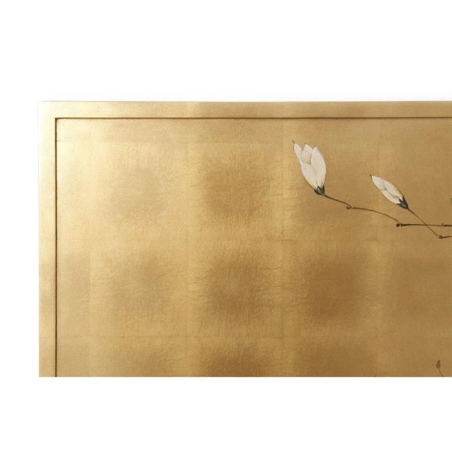 Set of Japanese paintings, each with a hand gilt background depicting a Japanese Magnolia painted sans traverse across the...