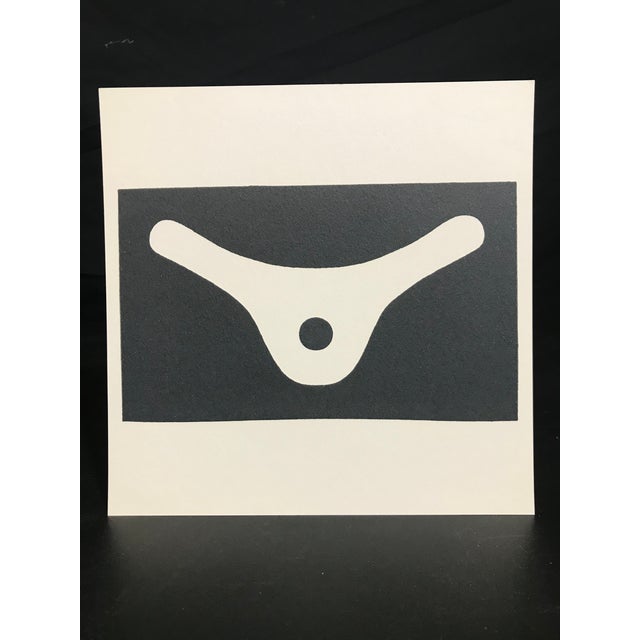 Number 235 of 1000. This print is in mint condition and includes the envelope.The Rubber Stamp Portfolio was originally...