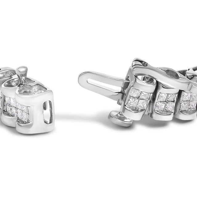 Immerse yourself in the luxurious brilliance of this meticulously crafted 14K white gold tennis bracelet. Designed to...