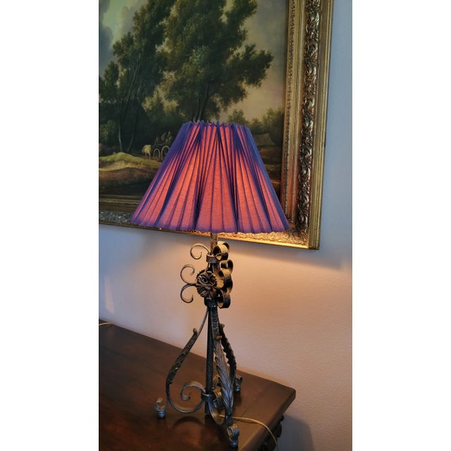 Elevate your space with this vintage wrought iron lamp base, a sculptural piece that blends rustic elegance with timeless...