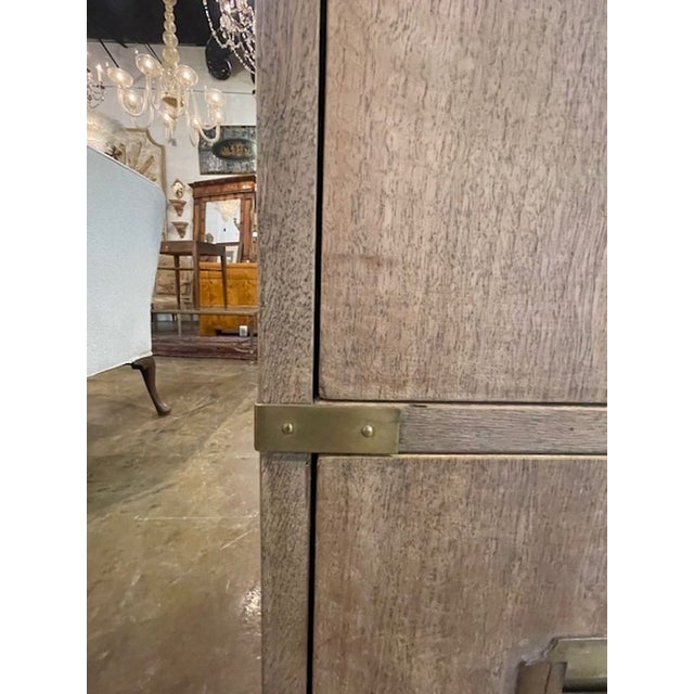 This product is a pair of vintage bleached mahogany campaign chests. These chests likely have a classic and timeless...